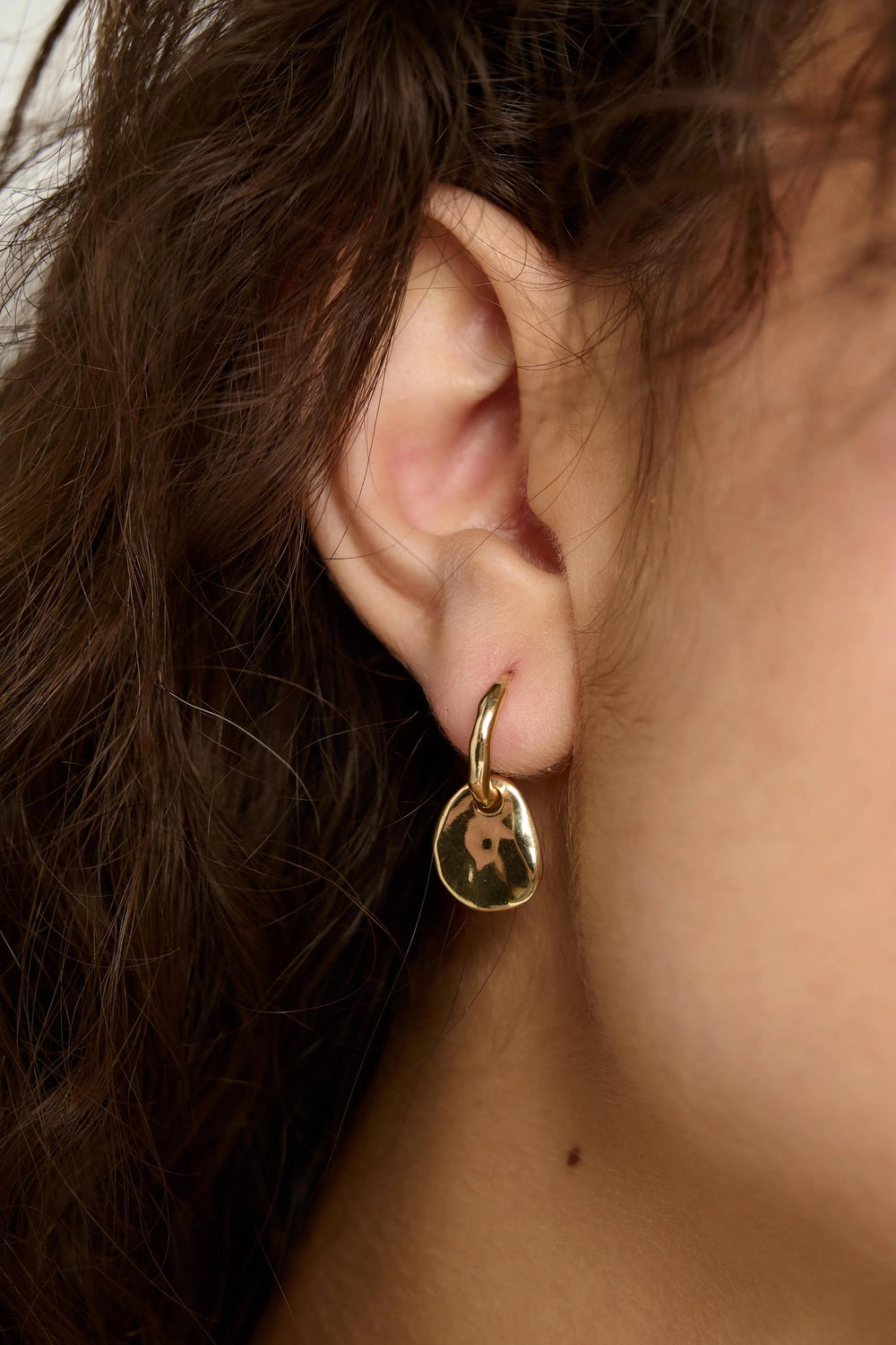 Gold Mist Earrings by Tutti & Co featuring delicate, shimmering hoop design for elegant everyday wear.