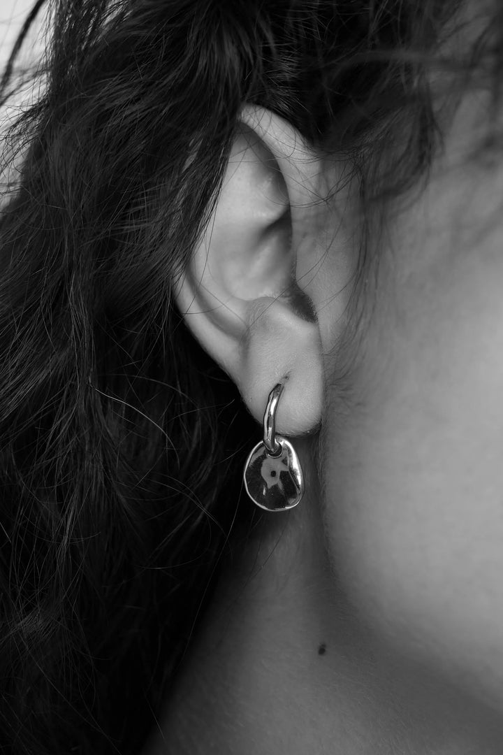 Tutti &amp; Co Mist Earrings featuring delicate, silver-toned dangle design with intricate detailing, perfect for elegant accessories.
