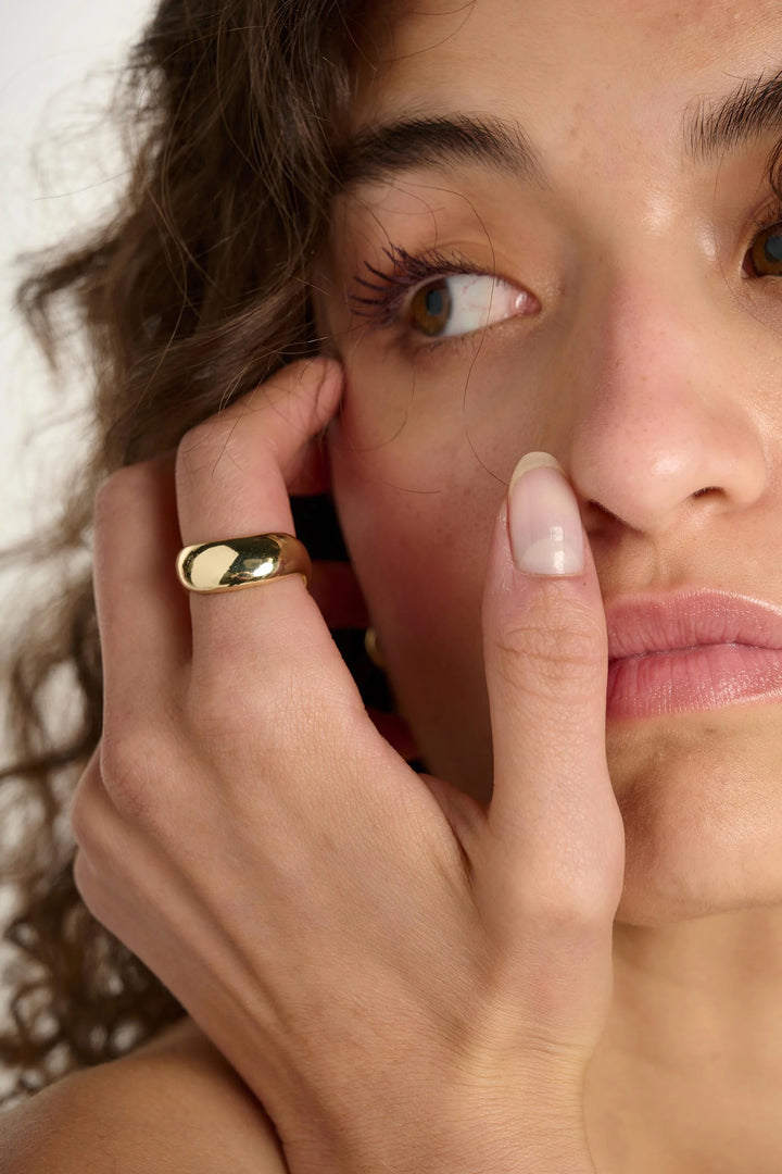 Medium Wave Ring by Tutti &amp; Co featuring a sleek, modern design in a natural metal finish.