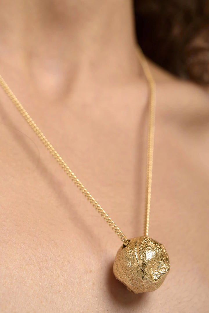 Gold Halo Necklace by Tutti &amp; Co featuring a delicate circular pendant on a fine chain.