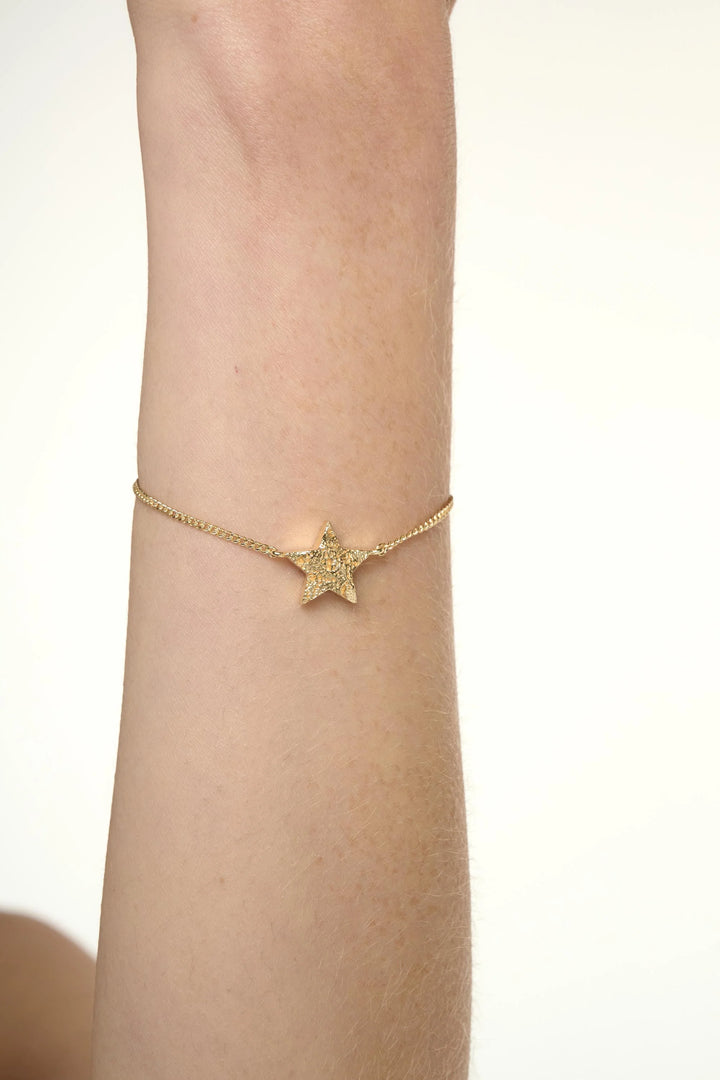 Gold Cosma bracelet by Tutti &amp; Co featuring delicate chain design, displayed on a neutral background for Cornucopia Home and Gift.