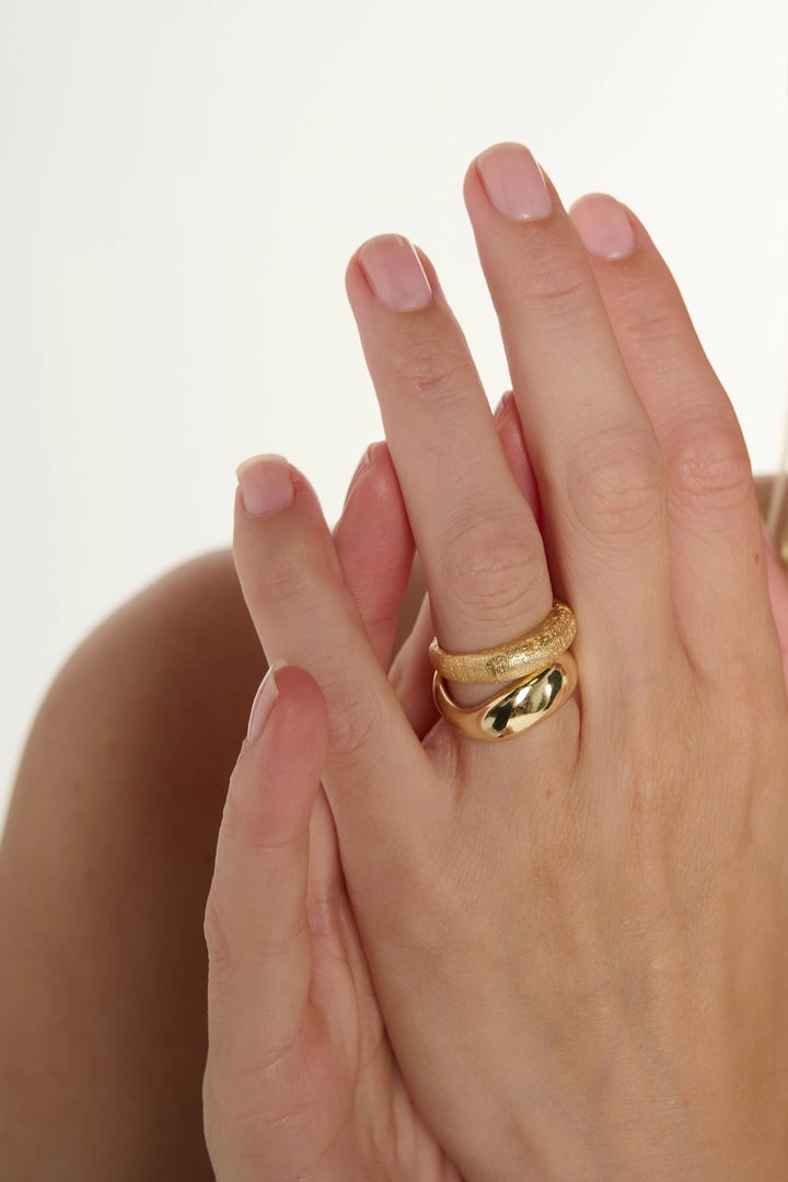 Medium Wave Ring by Tutti &amp; Co, handcrafted jewelry with a smooth, flowing wave design in a warm metallic finish.