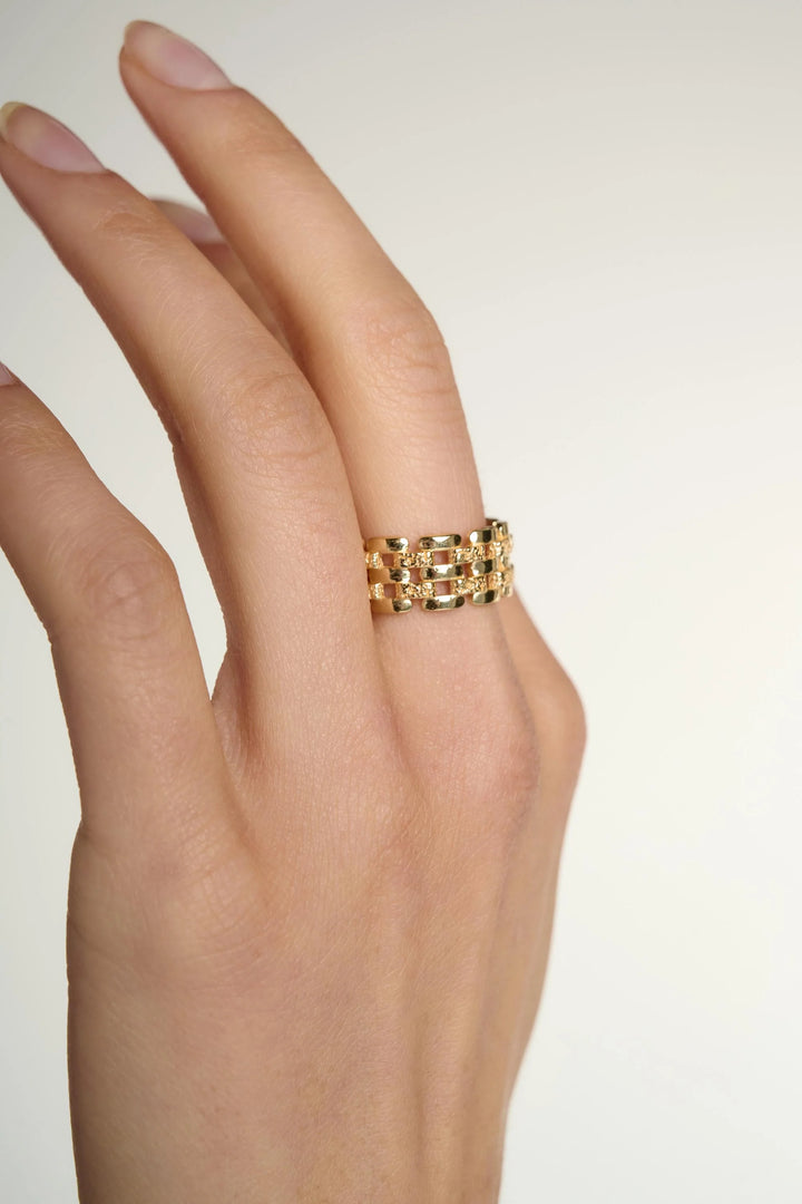 Medium linear ring by Tutti &amp; Co, featuring a sleek, modern design with a polished finish, ideal for home decor or jewelry accents.