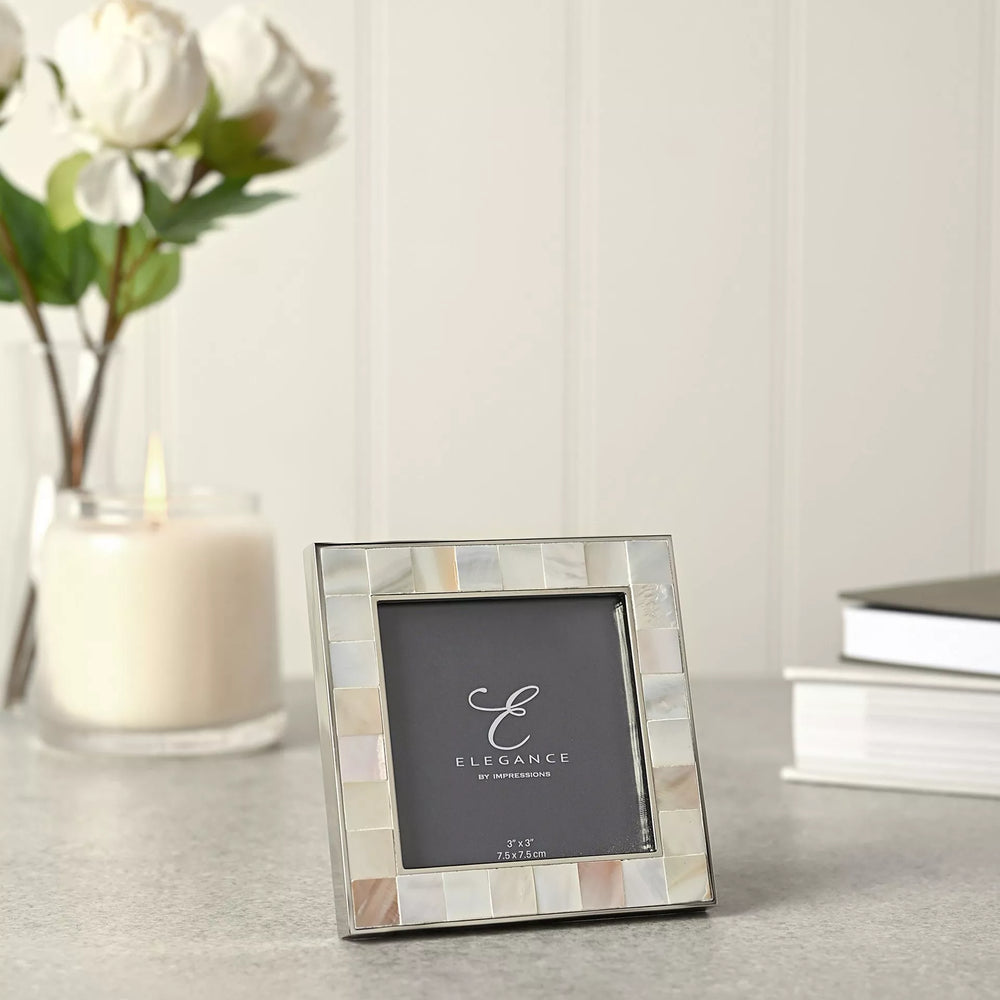 Elegant metal and mother of pearl photo frame by Widdop & Co, 3x3 inch size, boxed for gifting, featuring intricate design and polished finish.