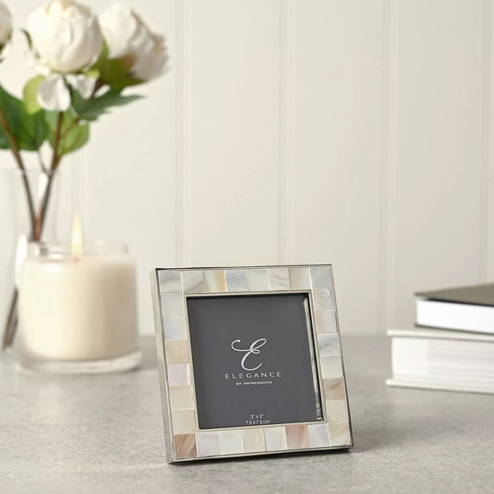 Elegant metal and mother of pearl photo frame by Widdop &amp; Co, 3x3 inch size, boxed for gifting, featuring intricate design and polished finish.