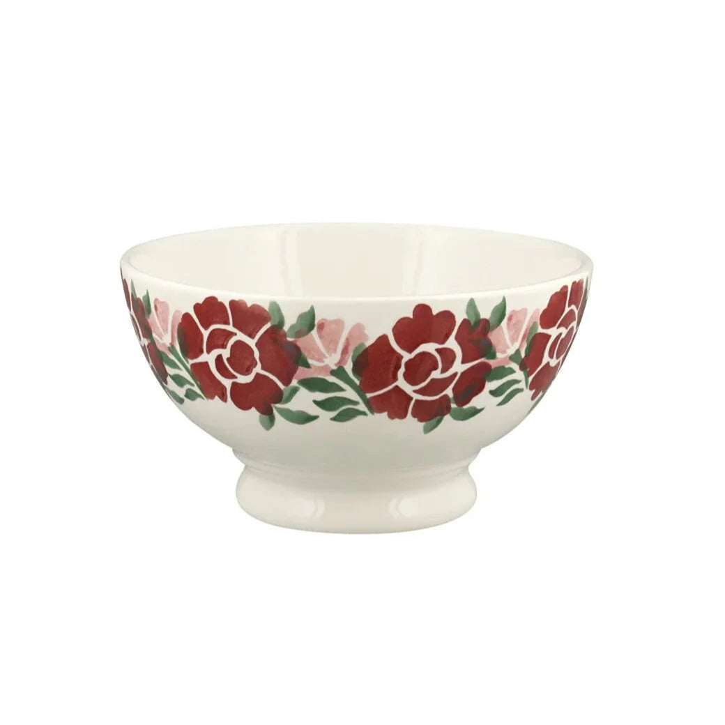 White ceramic bowl with floral design on a white background