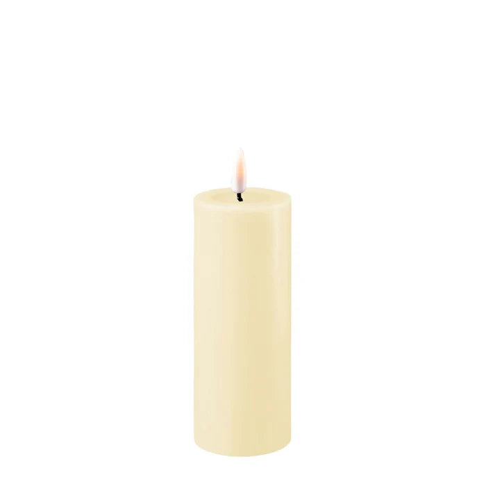 Cream LED candle with a 5x12.5cm size from Cornucopia Home and Gift's Deluxe Home Art collection, showcasing a realistic flickering glow.