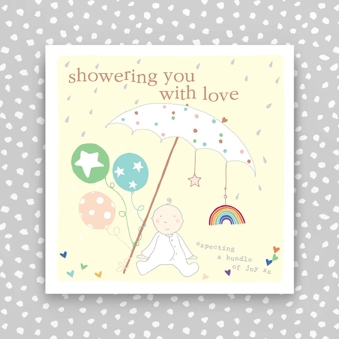 Molly Mae Baby Shower card titled "Showering You With Love" featuring pastel colors and floral design from Cornucopia Home and Gift.