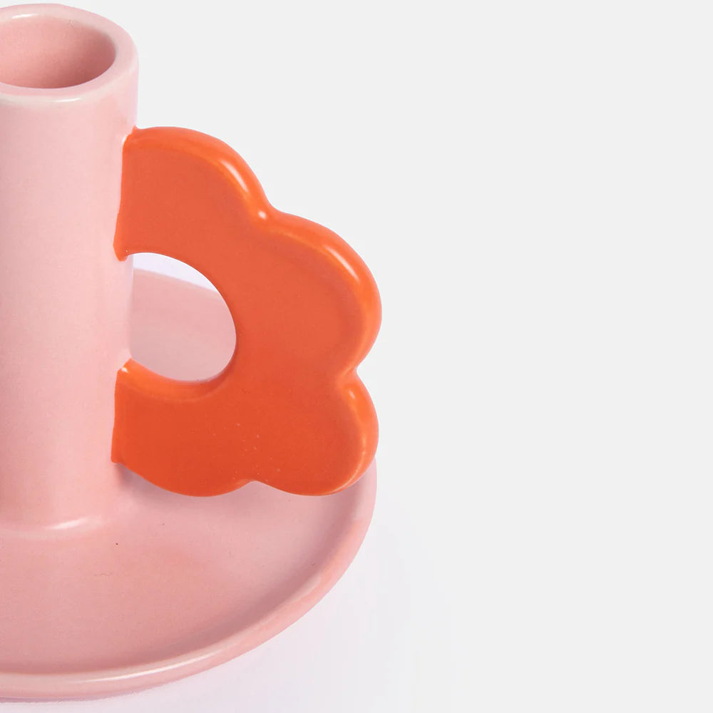 Pink flower-shaped Caroline Gardner candle holder from Cornucopia Home and Gift, featuring delicate floral design.