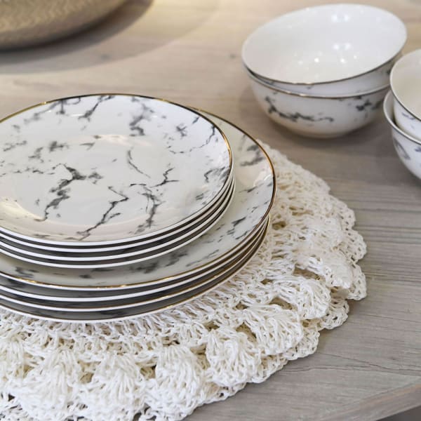 Set of 2 white crochet placemats from Coach House by Cornucopia Home and Gift, featuring intricate crochet patterns.