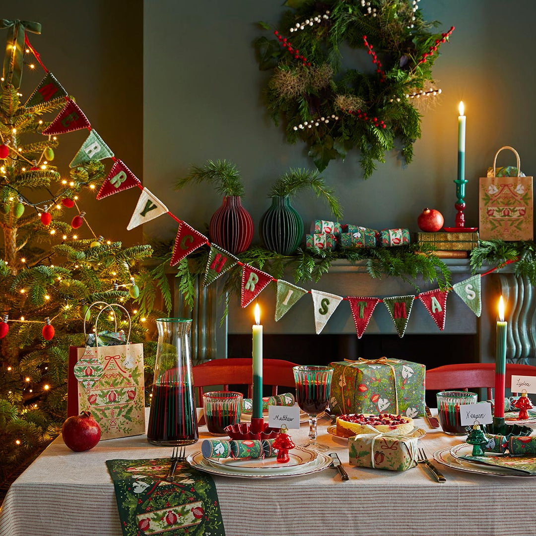 Talking Tables Christmas red and green stripe tumbler with festive design, made by Cornucopia Home and Gift.