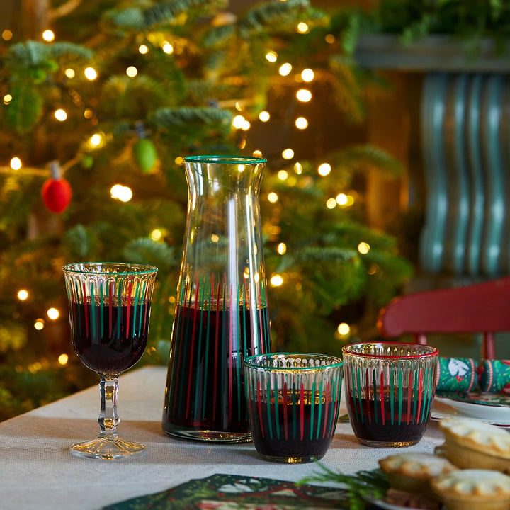 Red and green striped Christmas tumbler by Talking Tables from Cornucopia Home and Gift, featuring festive holiday design.