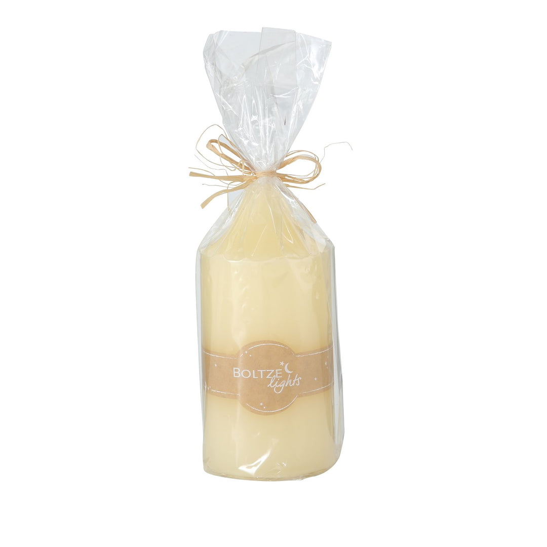 Cream pillar church candle from Boltze Christmas collection by Cornucopia Home and Gift, with intricate church design and smooth surface.