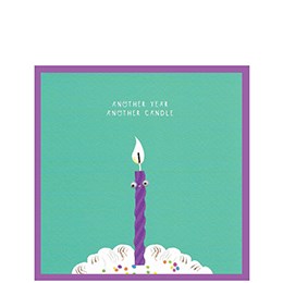Cinnamon Aitch Googly candle titled "Another Year Another Candle" in a decorative container, with a cinnamon scent, by Cornucopia Home and Gift