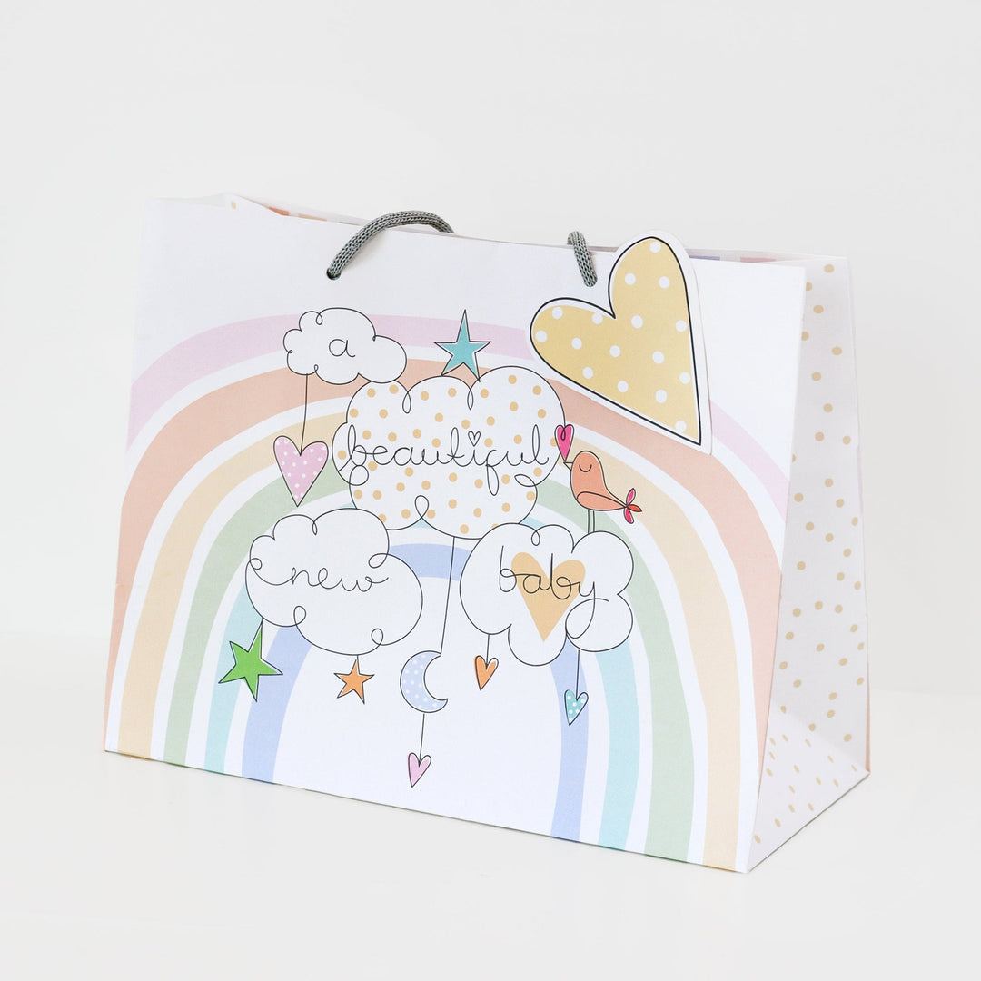 Generic baby tote gift bag featuring a belly button design from Cornucopia Home and Gift, with colorful illustrations and handles.