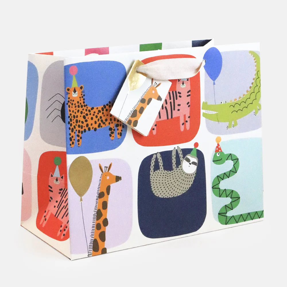 Caroline Gardner Party Pals Landscape Bag featuring colorful, playful design with cartoon characters on a fabric bag.