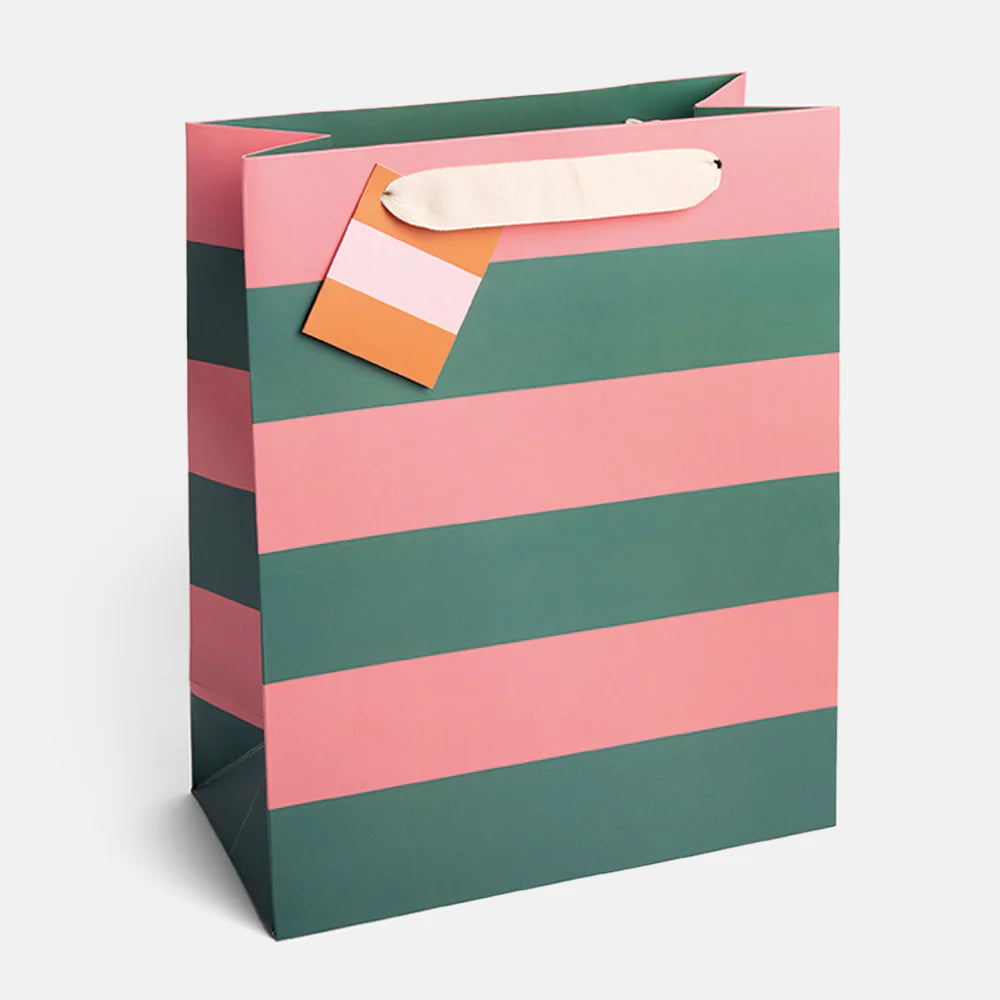 Large Caroline Gardner gift bag with green and pink stripe design, perfect for gift wrapping and presentation.