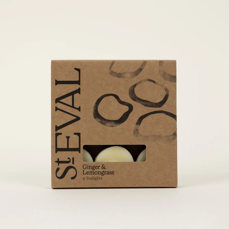 St Eval Ginger & Lemongrass scented tealights in clear holders, perfect for creating a warm, aromatic ambiance.