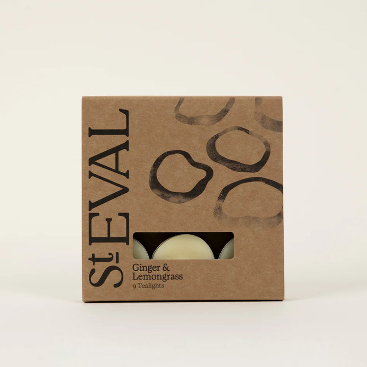 St Eval Ginger &amp; Lemongrass scented tealights in clear holders, perfect for creating a warm, aromatic ambiance.