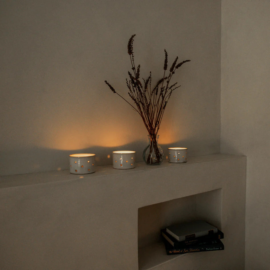 Set of three Ginger and Lemongrass scented tealights from St Eval by Cornucopia Home and Gift, featuring orange and green wax.