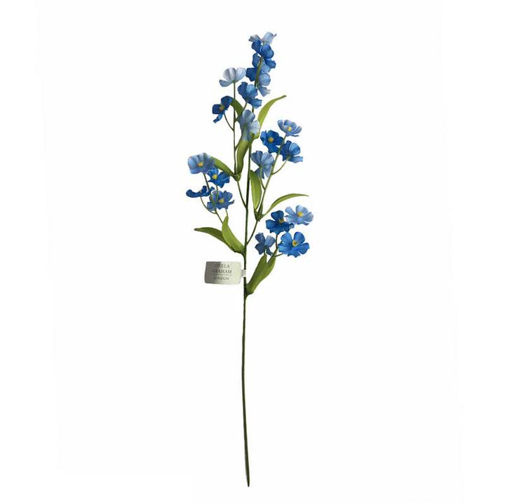 Gisela Graham Forget-Me-Not flower spray with delicate blue flowers and green foliage for Easter decoration.