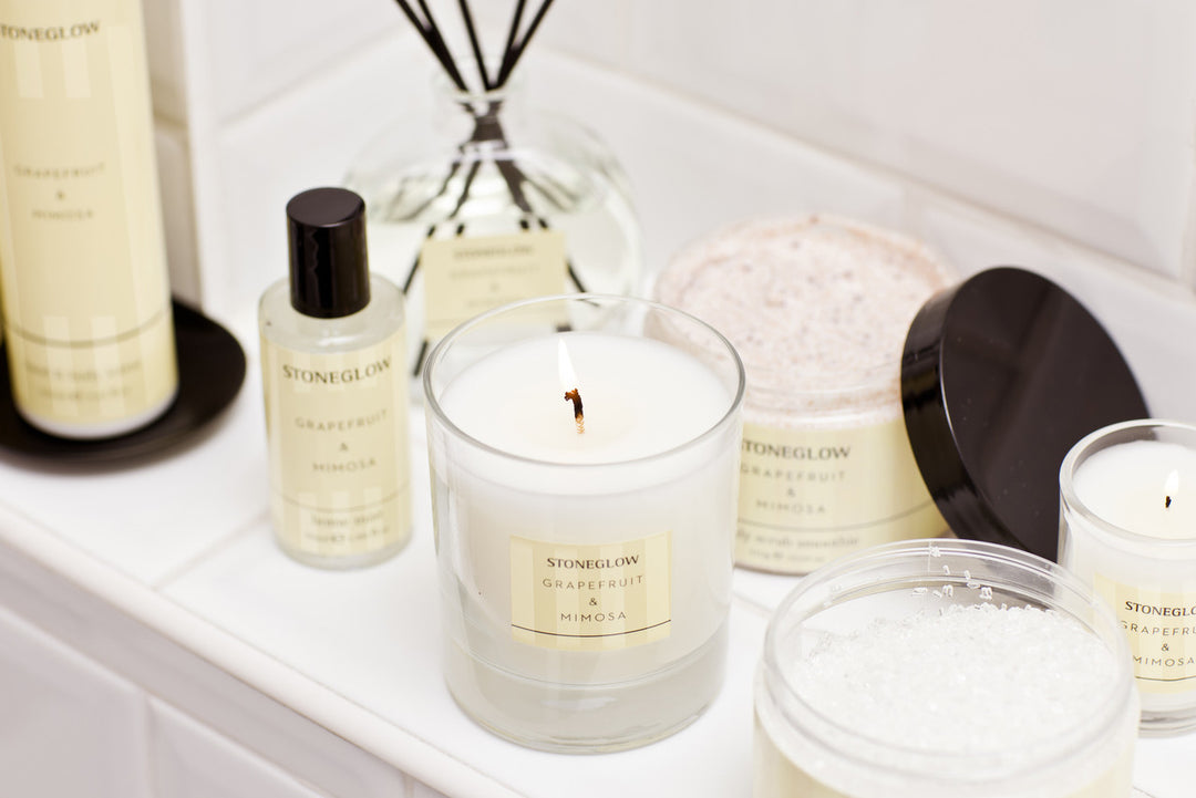 Stoneglow Modern Classics Grapefruit and Mimosa scented boxed tumbler candle with a modern design, perfect for home decor.