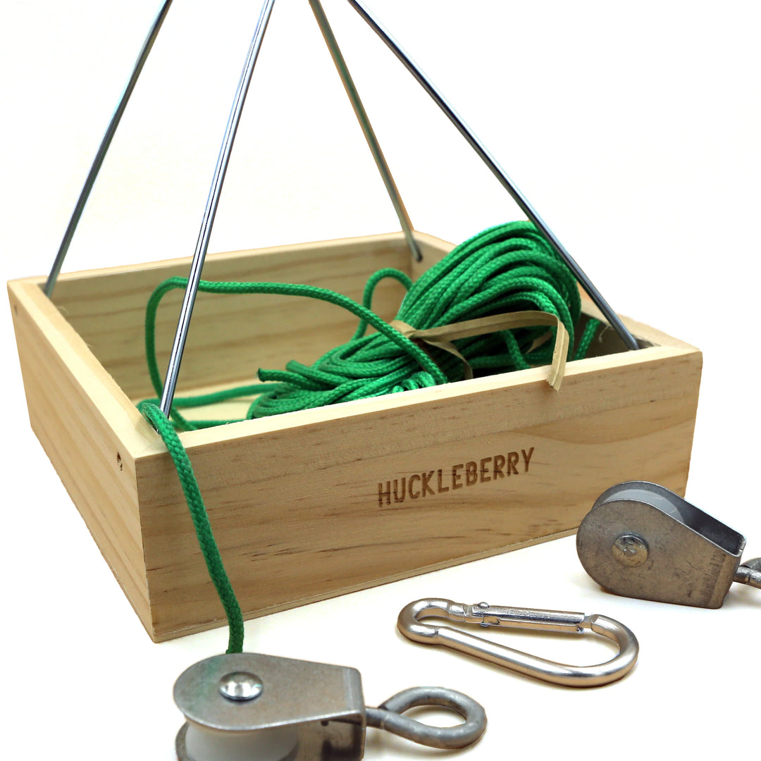 Kikkerland Huckleberry Cable Transport by Cornucopia Home and Gift, sleek cable management device on a white background.