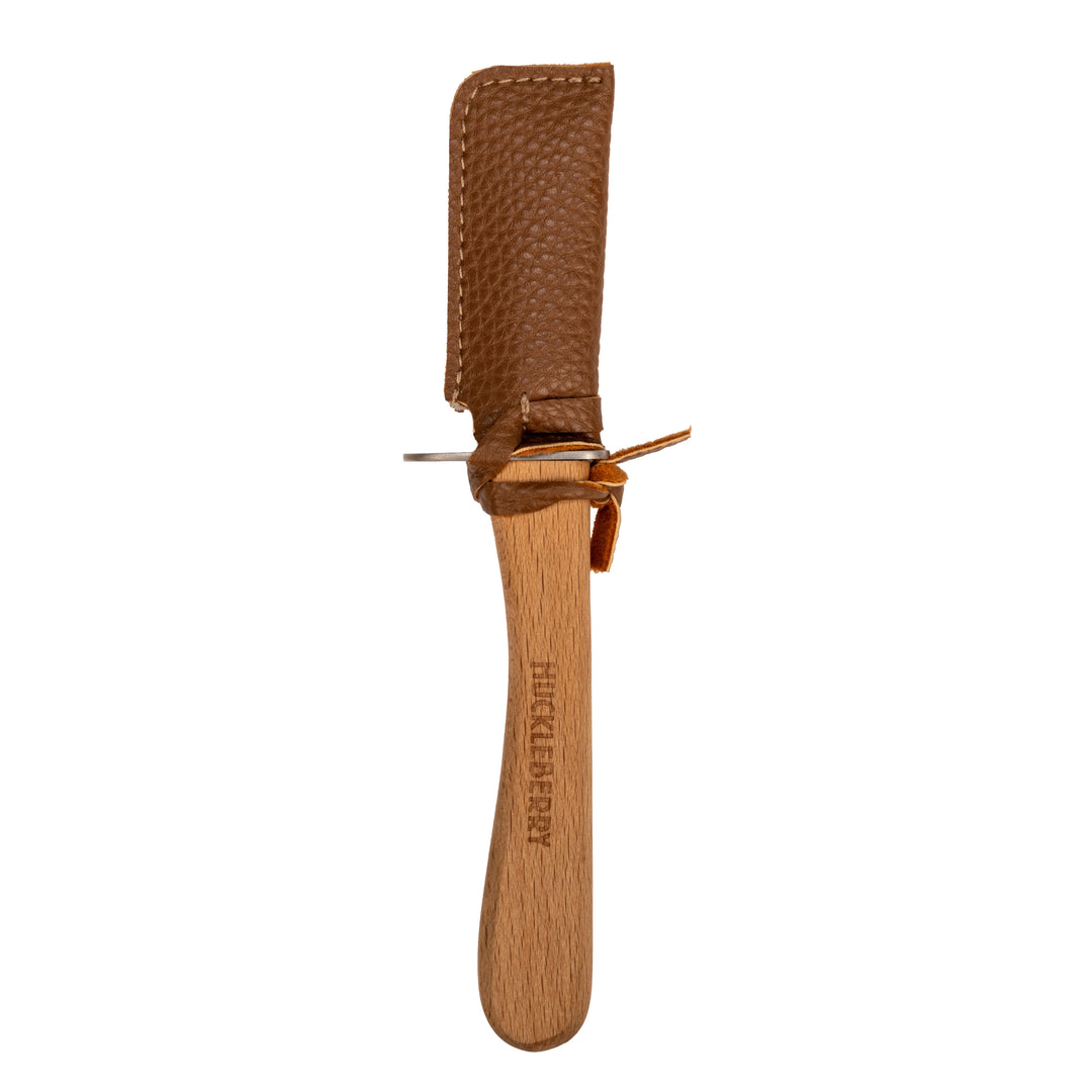 Kikkerland Huckleberry Carving Knife with wooden handle for precise food carving, designed by Cornucopia Home and Gift