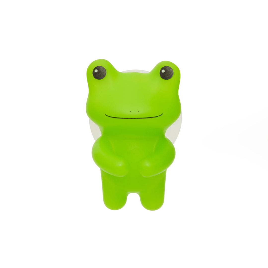 Kikkerland Frog Toothbrush Holder featuring a whimsical frog design, perfect for organizing bathroom toothbrushes.