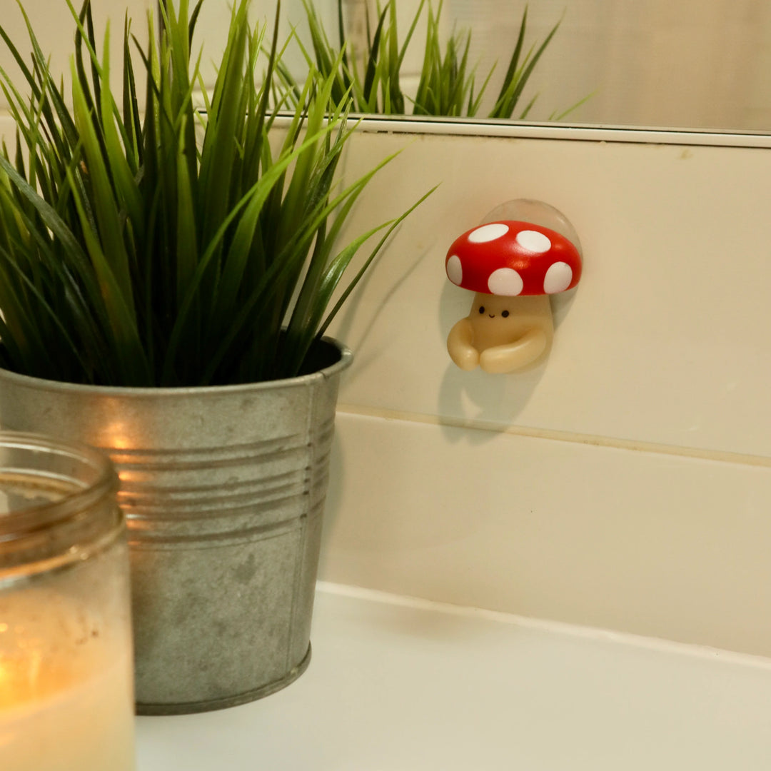 Kikkerland Mushroom Toothbrush Holder from Cornucopia Home and Gift, ceramic design with a mushroom shape, ideal for bathroom decor