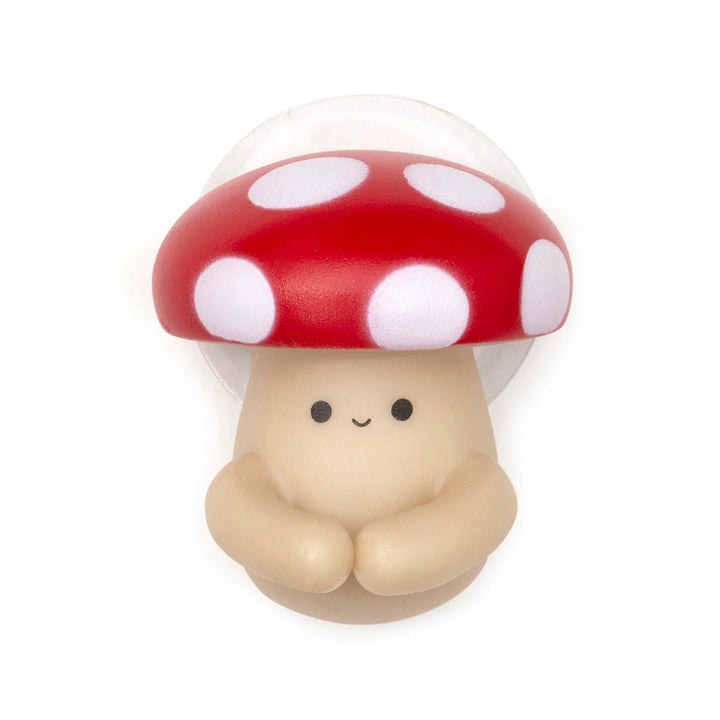 Kikkerland mushroom-shaped toothbrush holder from Cornucopia Home and Gift, featuring a whimsical design for bathroom organization.