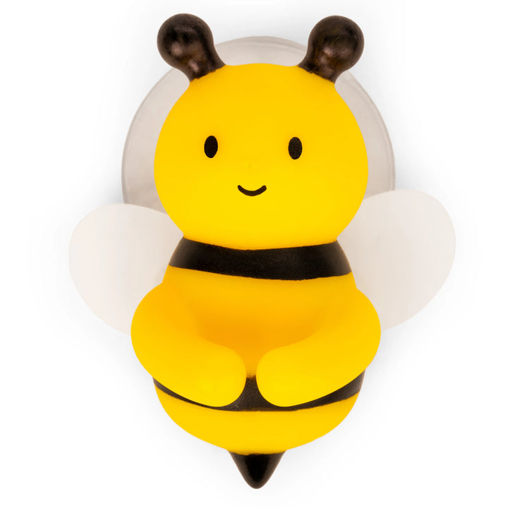 White Bee toothbrush holder by Kikkerland, made by Cornucopia Home and Gift, with a cute bee design on a white background.