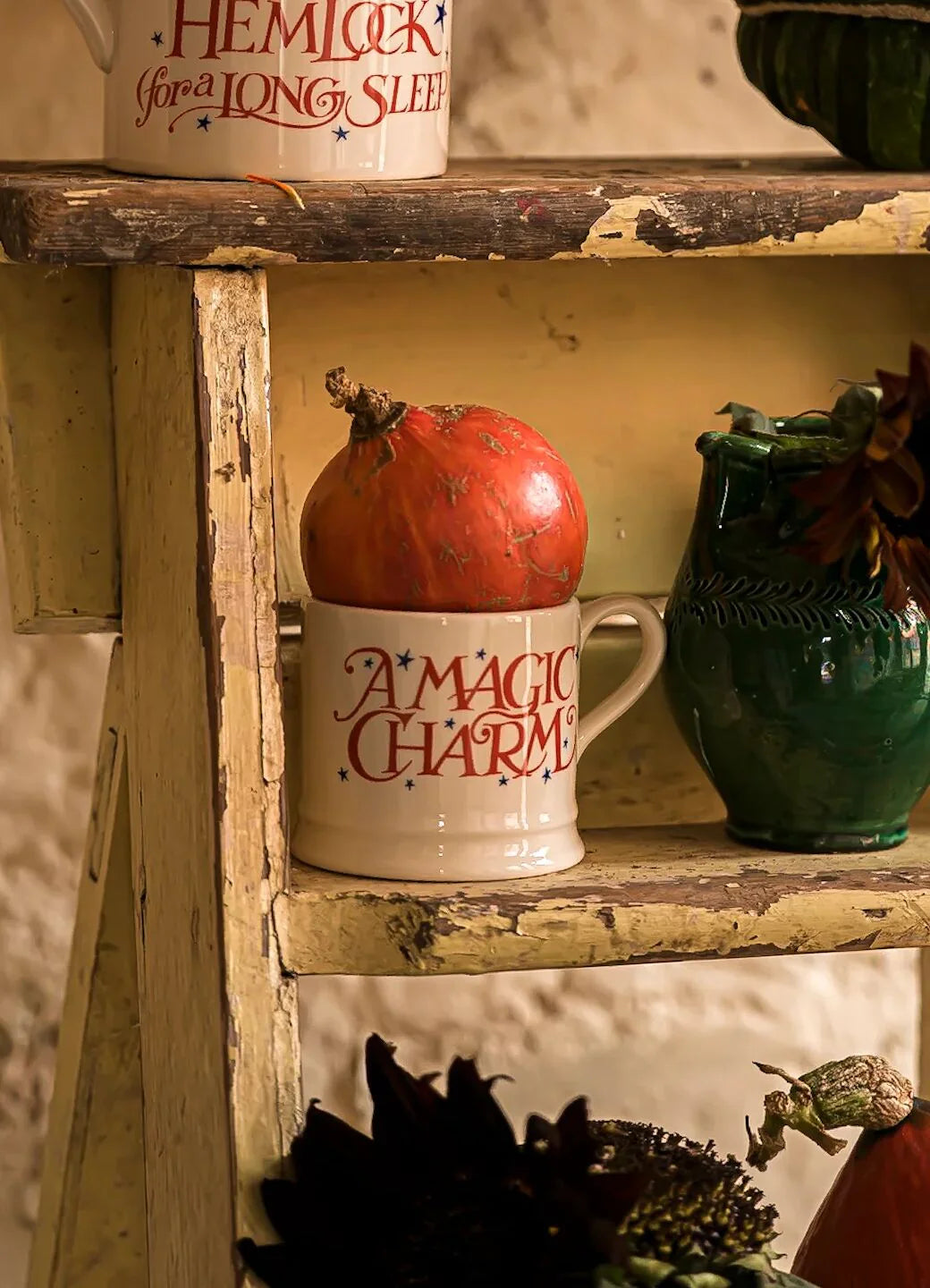 Emma Bridgewater Halloween Toast Magic Charm Small Mug with spooky toast design and festive orange and black colors.