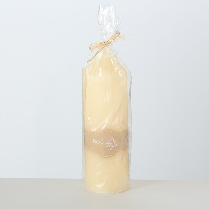 Cream pillar candle from Boltze Christmas by Cornucopia Home and Gift, featuring a church design, H30 D9.