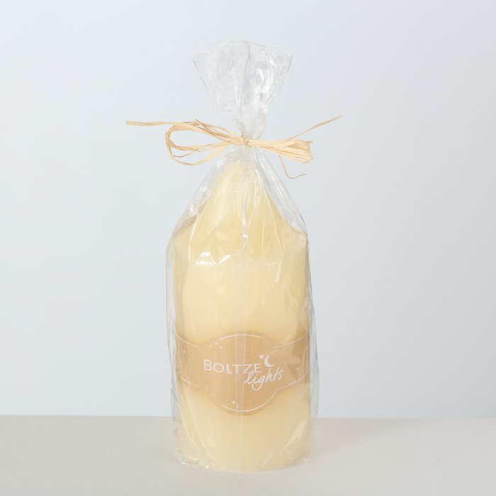 Cream pillar candle from Boltze Christmas by Cornucopia Home and Gift, designed to resemble a church pillar for holiday décor.