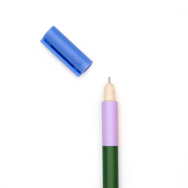 Kikkerland erasable pen with white barrel and black grip, perfect for writing and erasing notes or sketches.