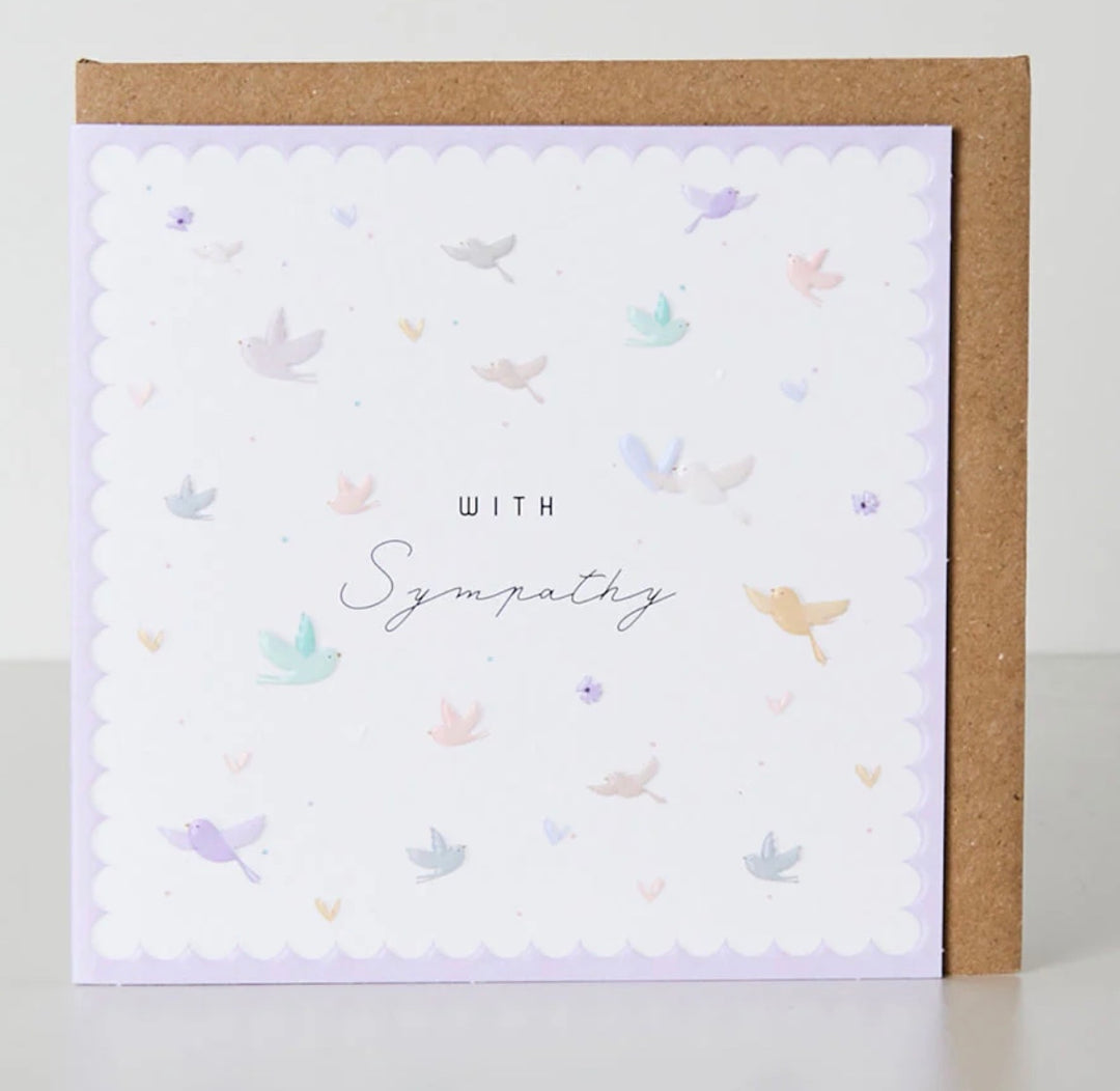 Belly button with with sympathy card from Ditsy Collection by Cornucopia Home and Gift, featuring delicate floral design.