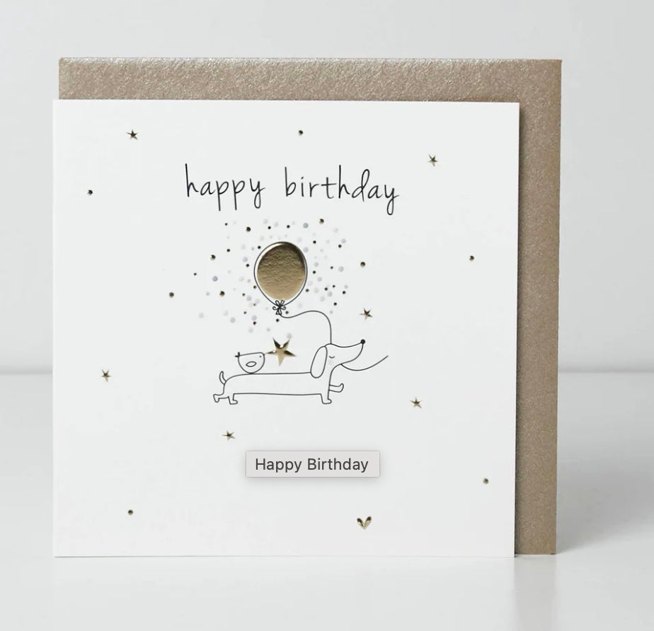 Belly button birthday card featuring a cute sausage dog design from Cornucopia Home and Gift