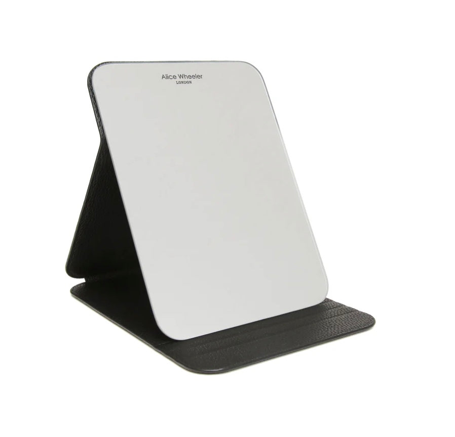 Alice Wheeler navy folding travel mirror with compact design, perfect for on-the-go grooming and makeup application.