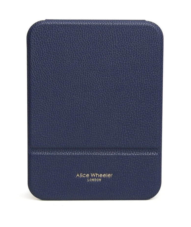 Alice Wheeler navy folding travel mirror showing compact design with adjustable stand and reflective surface for on-the-go use.