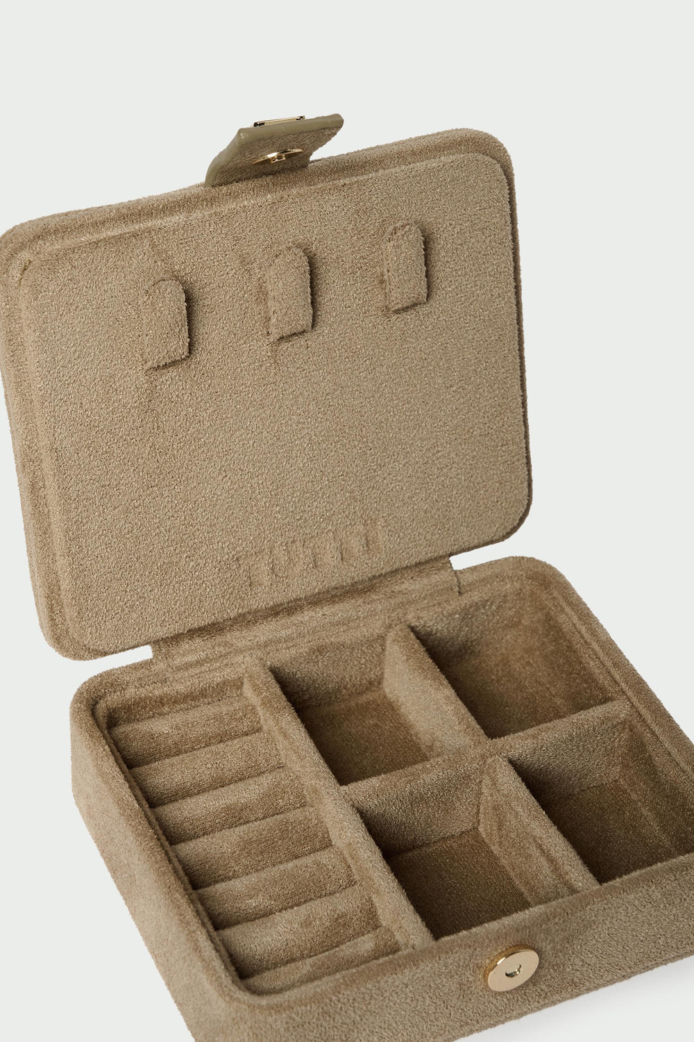 Mini suede jewellery box by Tutti & Co from Cornucopia Home and Gift, featuring a soft sand color and compact design.