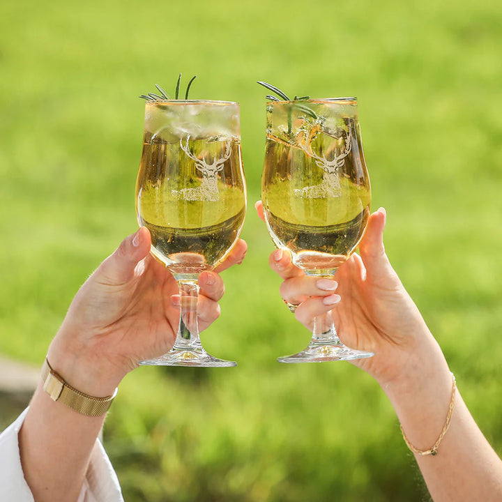 Set of 2 Selbrae House stag craft beer glasses with etched stag design, clear glass, perfect for serving craft beers.