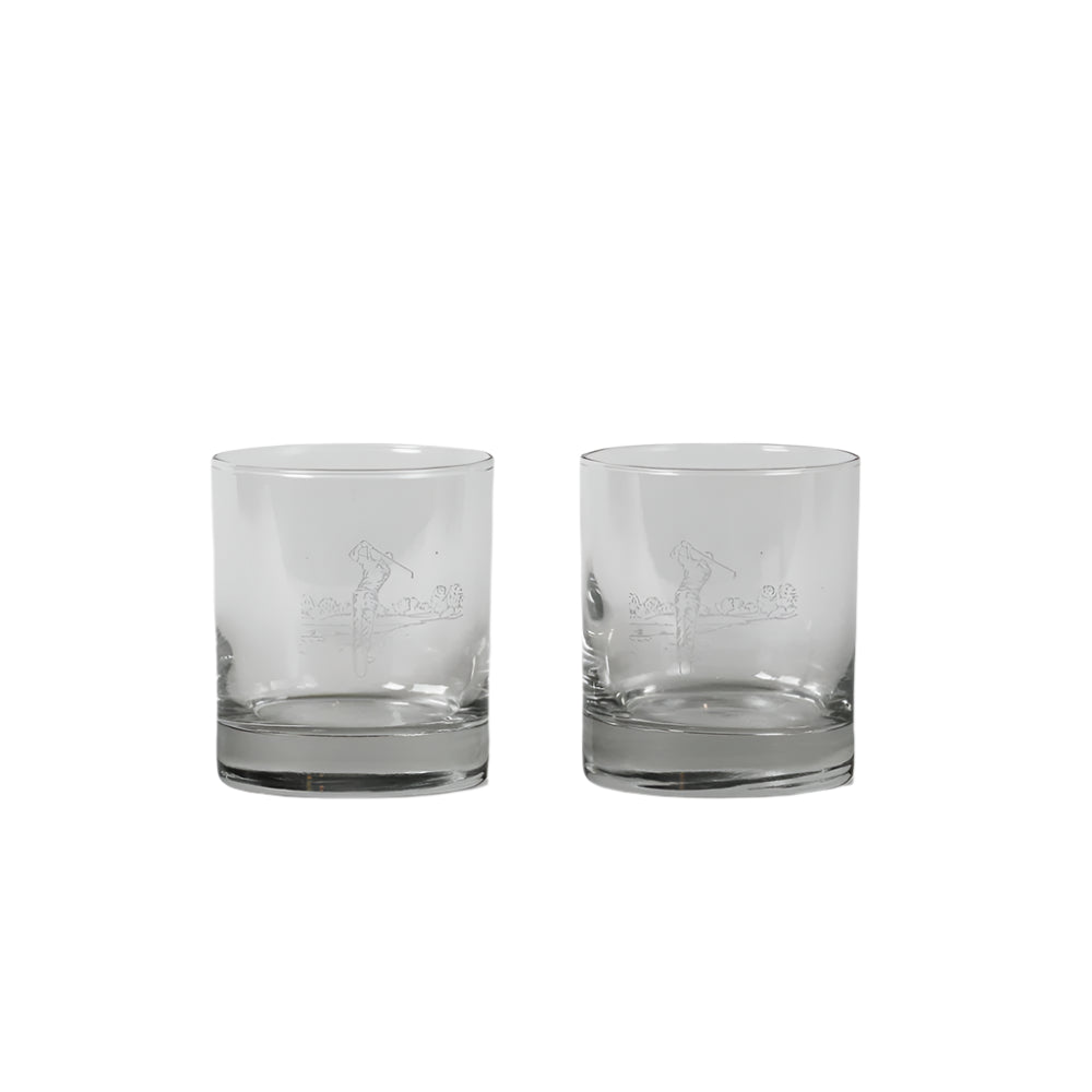Set of 2 Selbrae House golf-themed glass tumblers with engraved golf ball and tee designs, perfect for outdoor or casual drinking.
