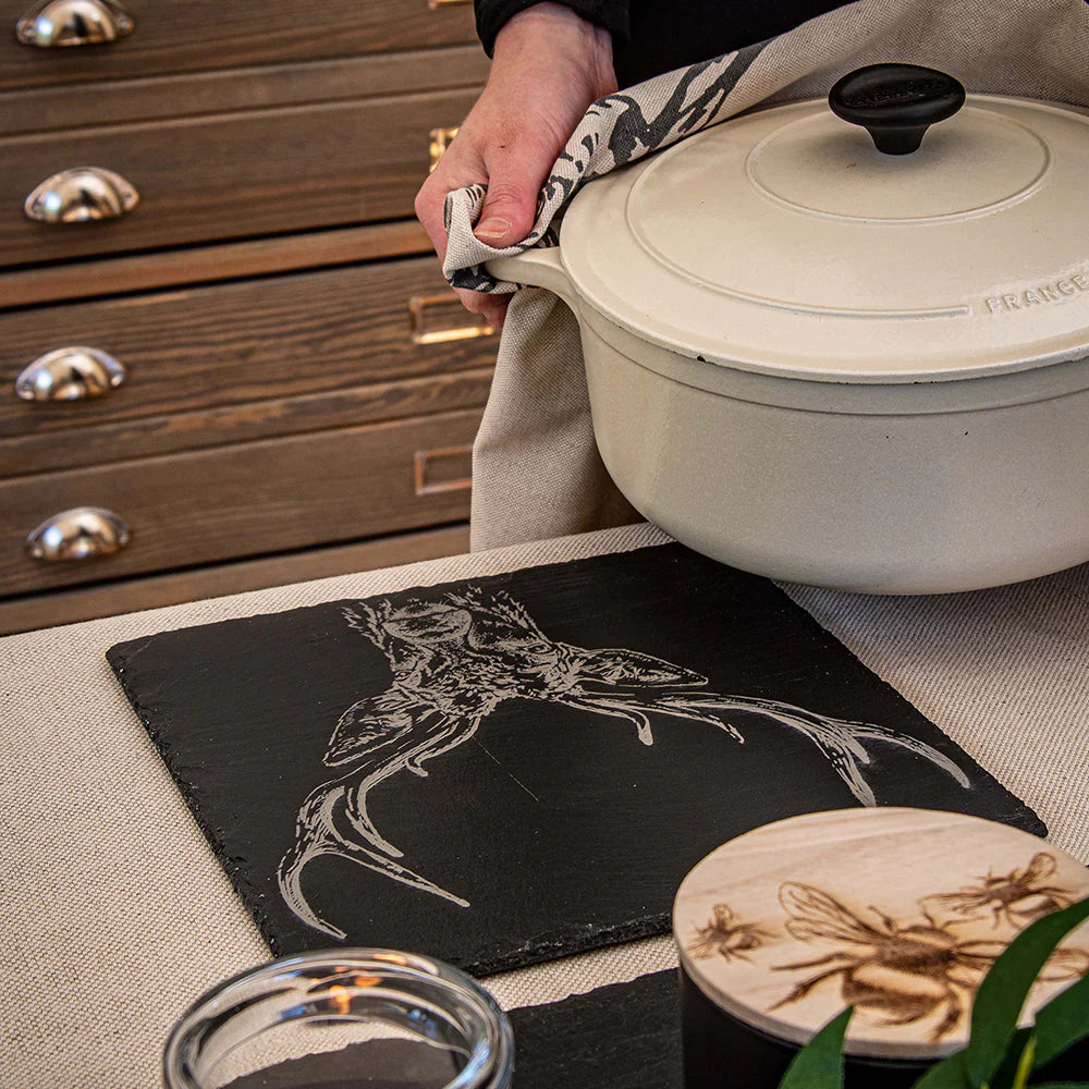 Selbrae House Stag Prince slate pot stand with engraved stag design, perfect for protecting surfaces from hot cookware.
