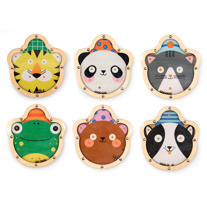 Kikkerland Kidoki Double Sided Tilt &amp; Roll Puzzle by Cornucopia Home, showing colorful puzzle pieces on a table.