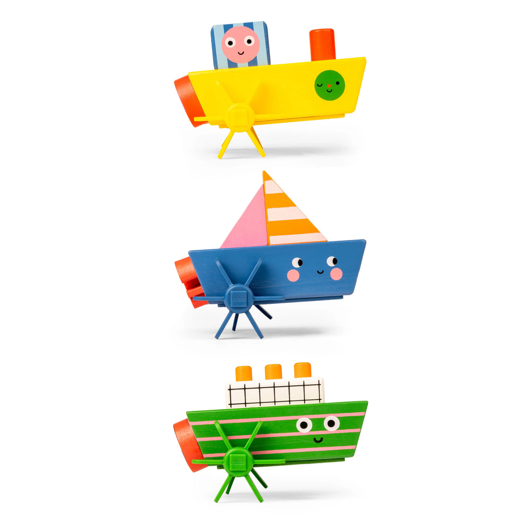 Kidoki wind-up bath toy by Kikkerland featuring colorful plastic design for kids' bath time fun.