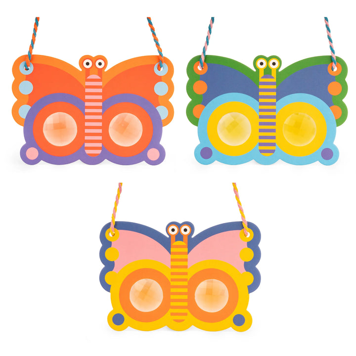 Kikkerland Butterfly Prism Lens by Cornucopia Home and Gift, colorful glass prism with butterfly design and reflective surfaces.