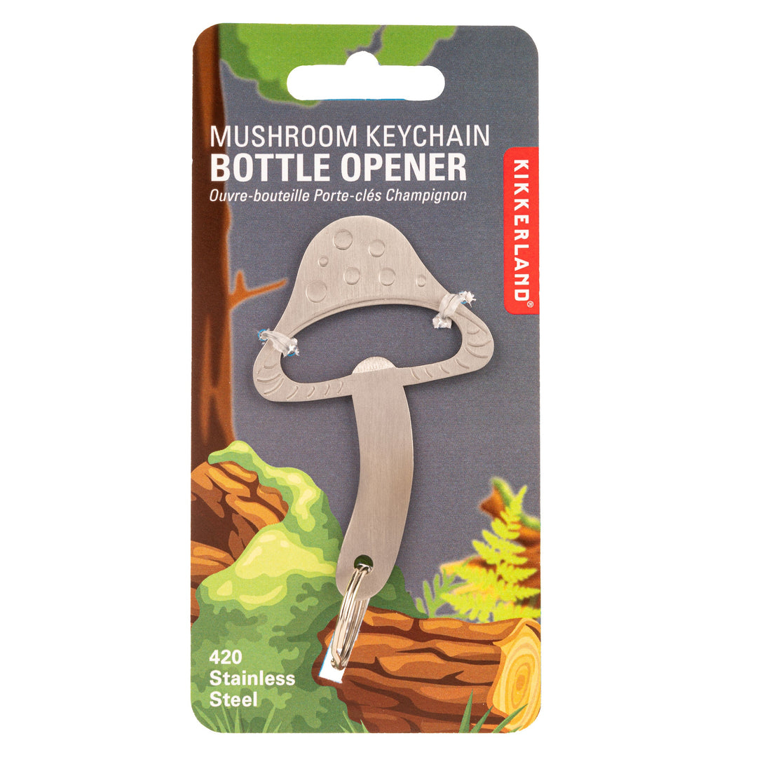 Kikkerland mushroom-shaped bottle opener keyring with packaging, compact metal design for opening bottles on the go.