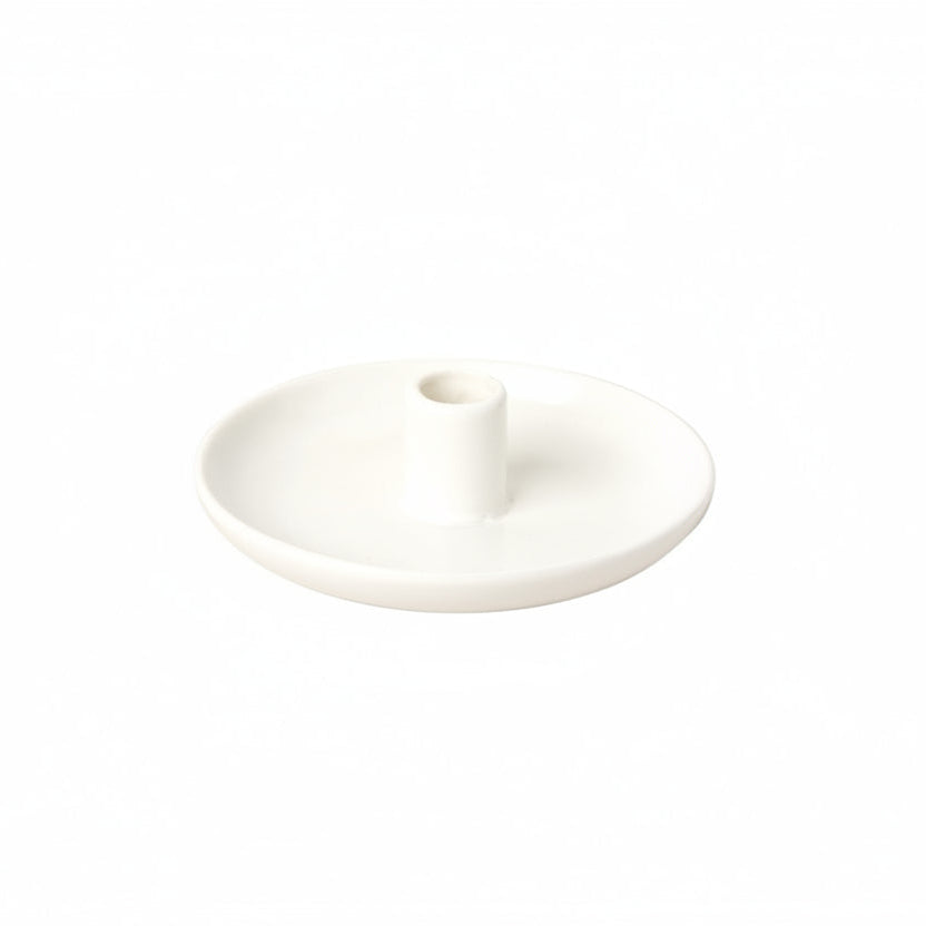 White ceramic candle holder from Cornucopia Home and Gift's Ideal Home Range, designed for decorative candle display.
