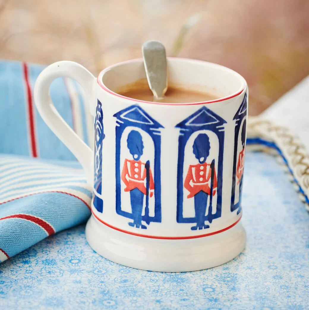Emma Bridgewater King’s Guard ½ Pint Mug featuring iconic London design, white ceramic with detailed guard illustration.